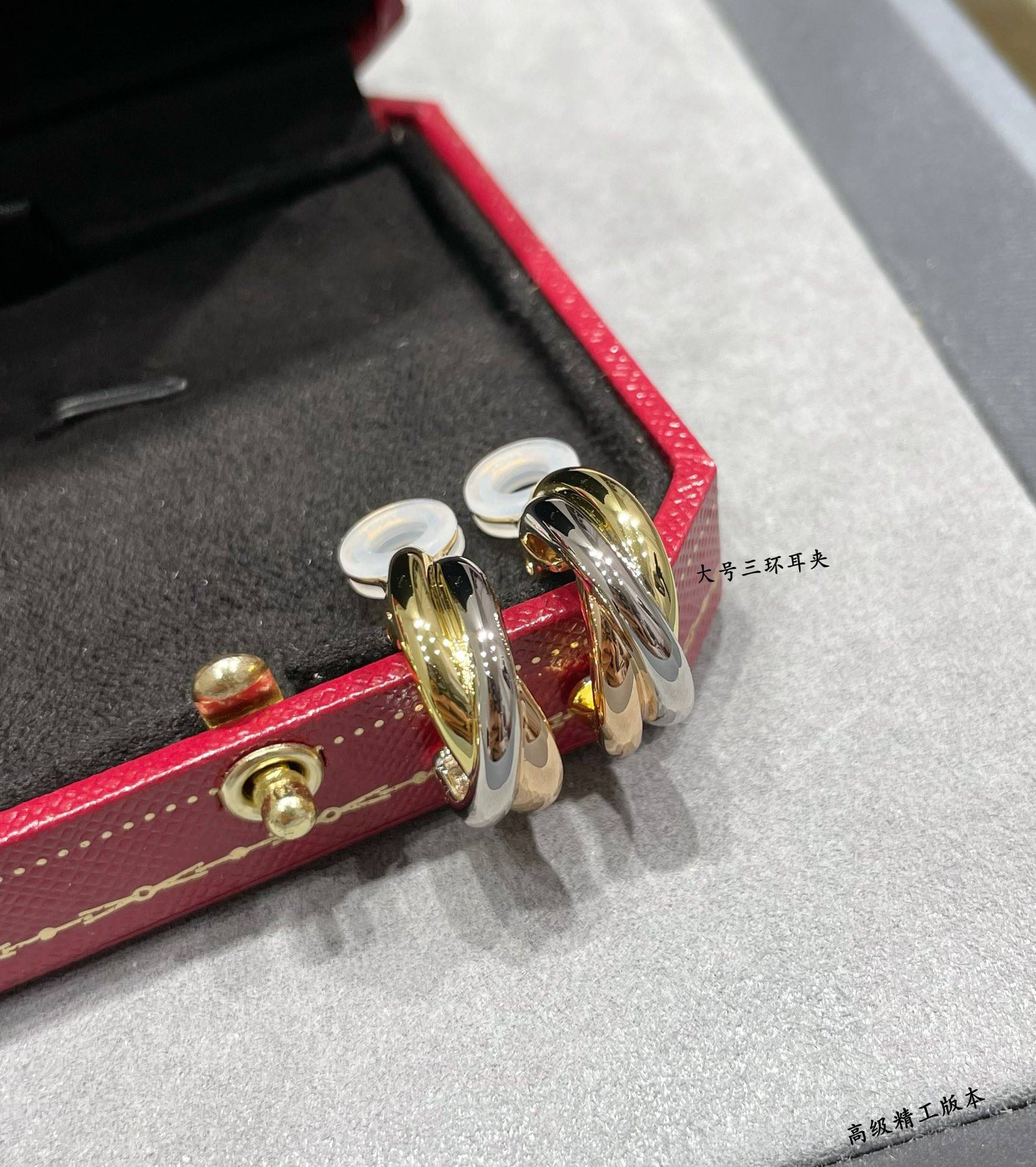 Ca*t*er large three-hand earrings