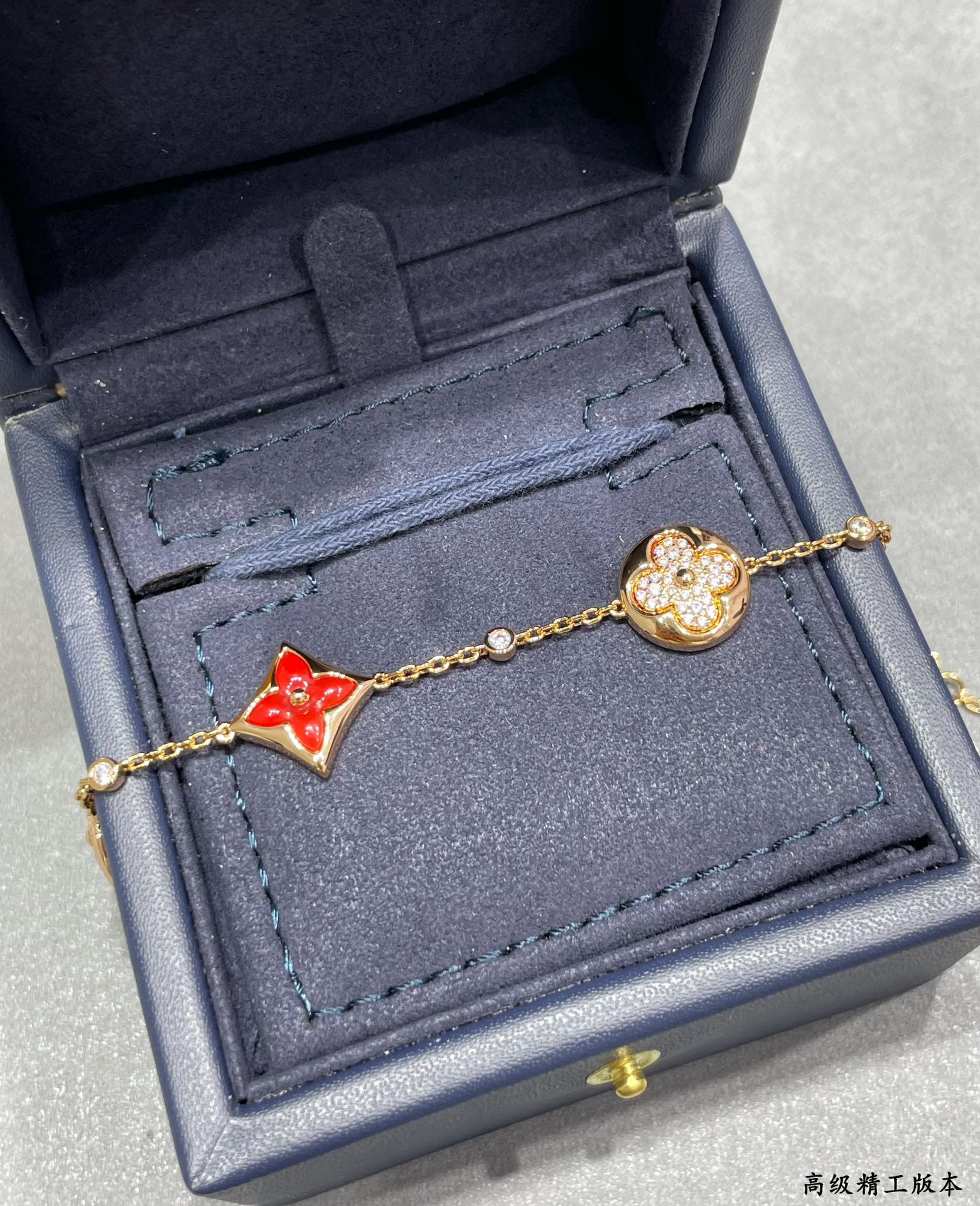 l0*is vuitto large with red agate and Di*m*nds four-flower bracelet