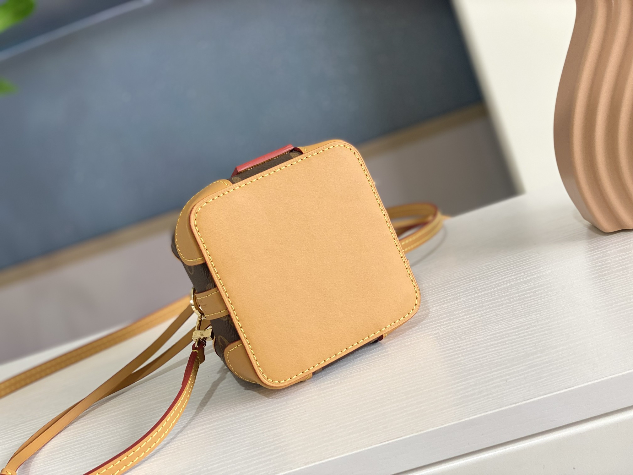 LV M57099 NOE PURSE 4.5 x 4.7 x 4.5 inches