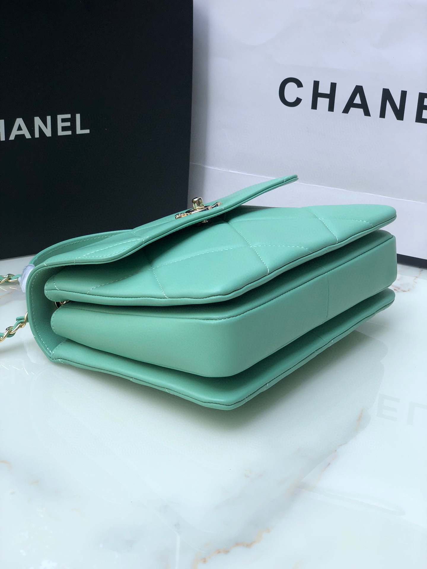 Ch*el flap bag with top handle blue 6.6 × 9.8 × 4.7 in