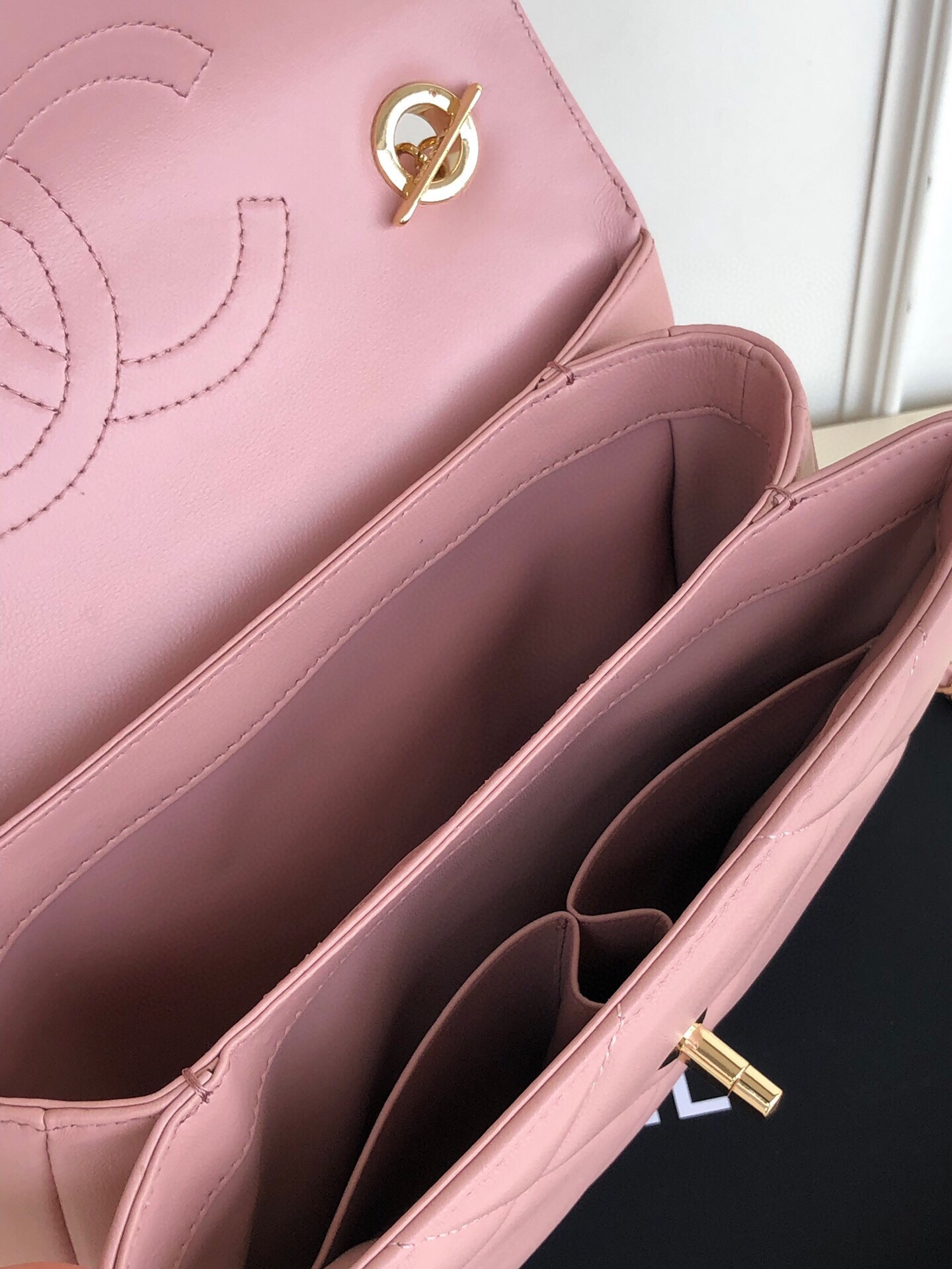 Ch*el flap bag with top handle 6.6 × 9.8 × 4.7 in