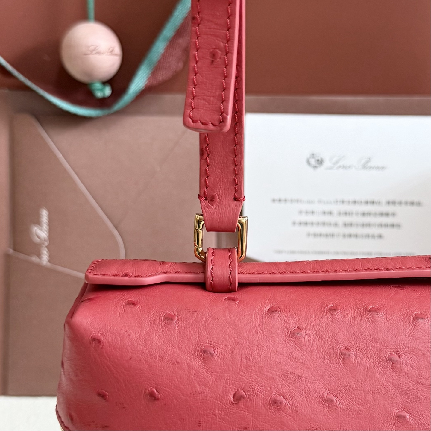 L**o p*ana extra pocket l27 ostrich-grained leather 16x27x10cm